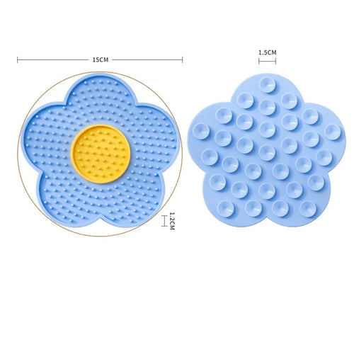 Blue silicone pet licking mat for dogs and cats, sunflower shape slow feeder bowl for calming and entertainment.