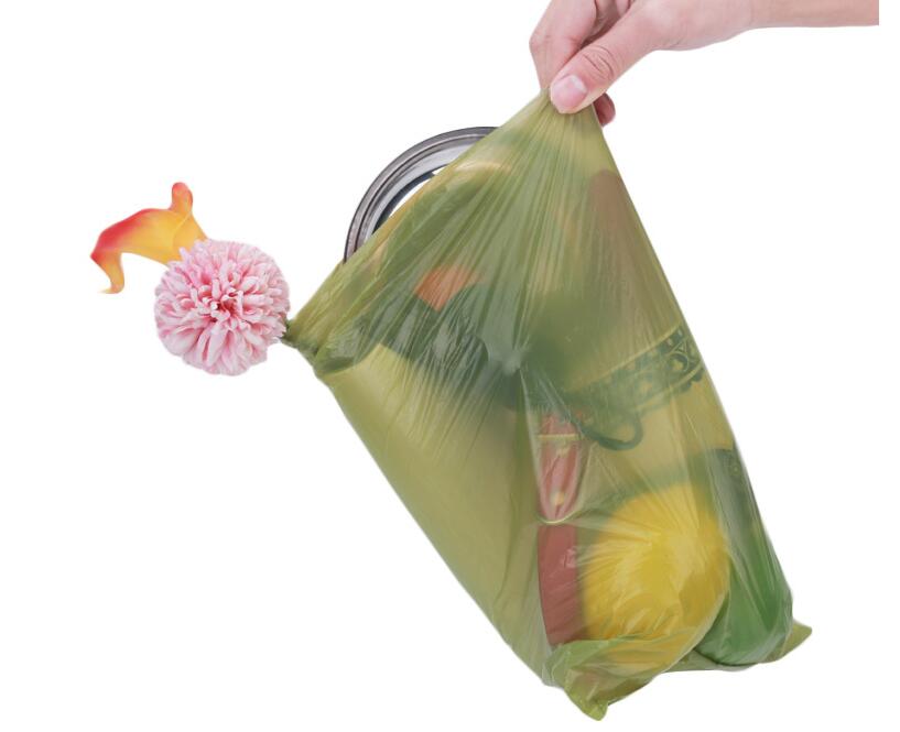 Black biodegradable eco-friendly pet waste bags by Brandywines Time, shown in a roll for convenient pet waste disposal.