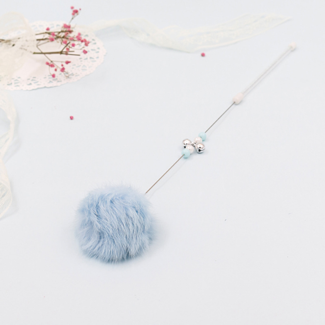 Colorful pom-pom cat teaser wand with bell from Brandywines Time, featuring a grey handle and vibrant pom-pom for playful fun.