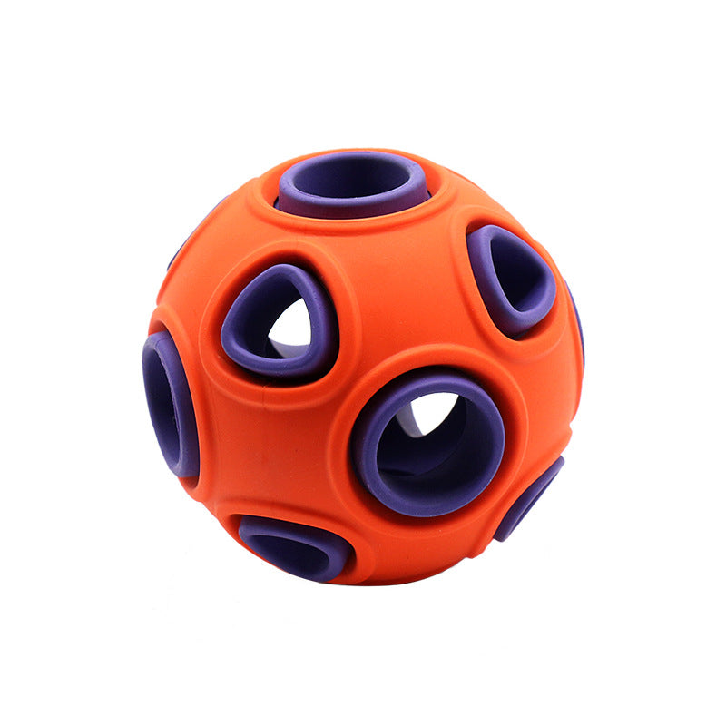 Orange glow-in-the-dark dog toy ball for chewing, medium/large size, made by Brandywines Time for playful fetch and dental fun.