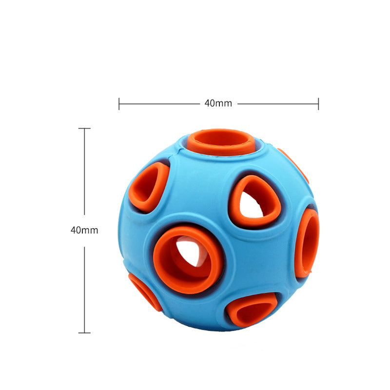 Orange glow-in-the-dark dog toy ball for chewing, medium/large size, made by Brandywines Time, designed for active dogs.