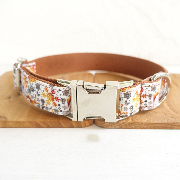 Handmade golden Christmas dog collar by MUTTCO, featuring festive design and adjustable fit for small dogs by Brandywines Time.