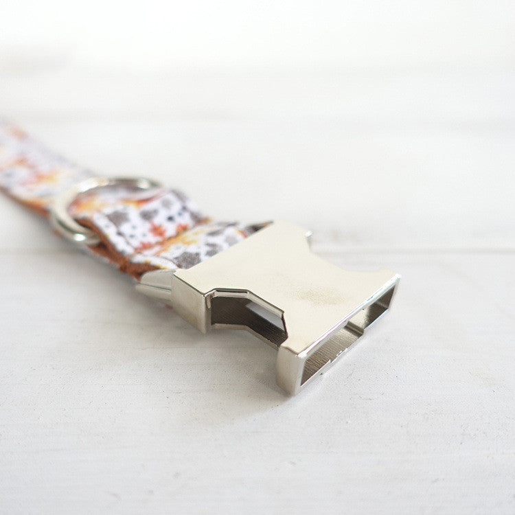 Handmade golden Christmas dog collar by MUTTCO, designed for small dogs, with festive gold accents and adjustable fit.