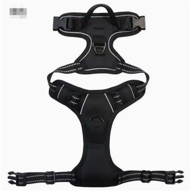 Black reflective nylon dog harness with chest and back straps, designed for visibility and comfort for dogs.