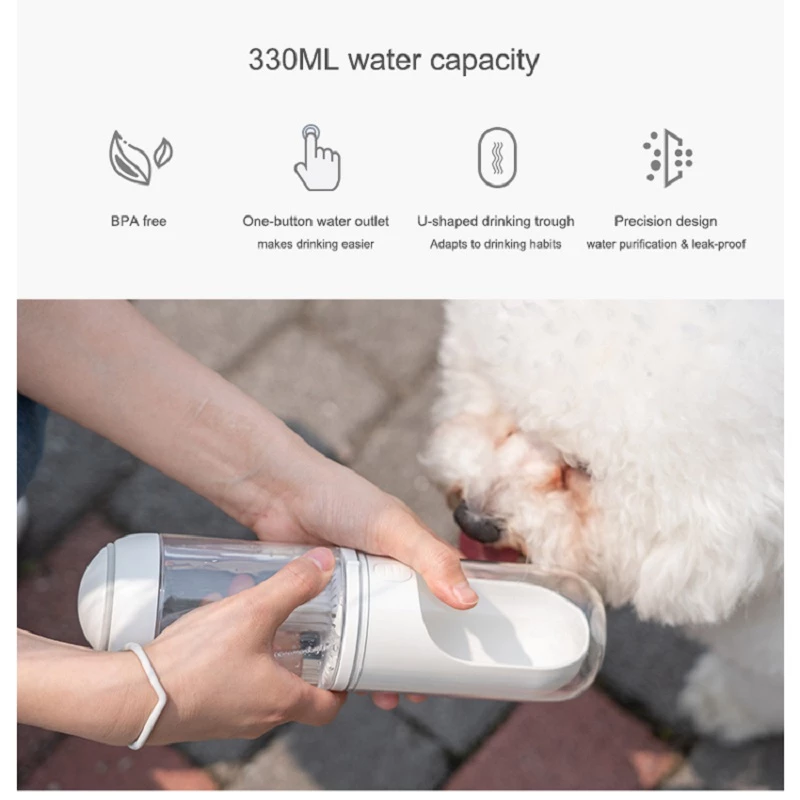 Pink outdoor travel pet water dispenser by Lilac Milo, portable dog and cat water bottle for on-the-go hydration.