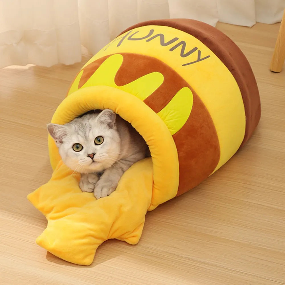Yellow Pandora honey jar-themed cat bed with soft fabric and cozy design, perfect for small cats or kittens.