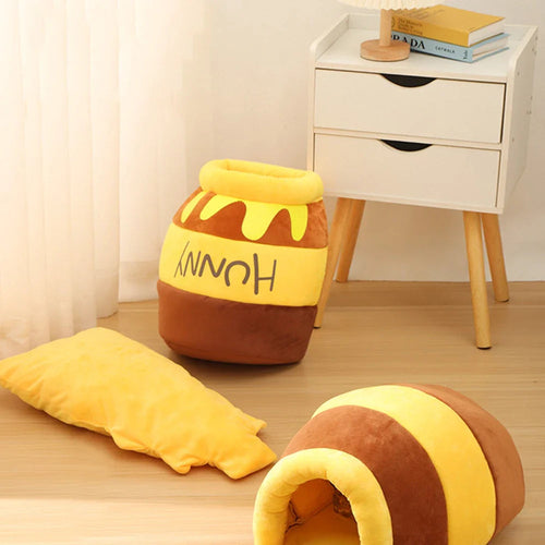 Yellow Pandora honey jar-themed cat bed featuring a cozy, plush design perfect for small cats or kittens.