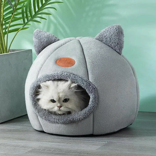 Yellow Pandora cozy 2-in-1 pet house bed with soft blankets, ideal for small pets, showcasing a comfortable, versatile pet sleeping space.